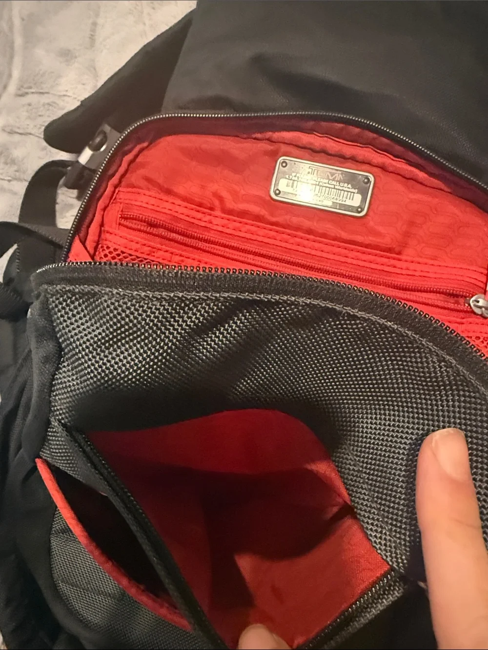 Tumi Black Nylon Men's Backpack with Red Logo Accent
